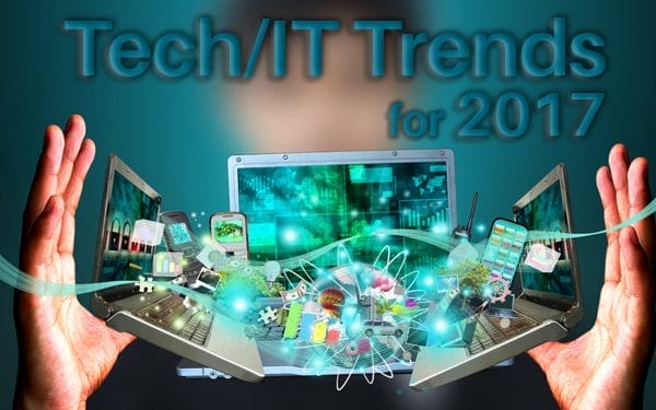 hands holding a laptop and animated technology with the text "Tech/IT trends for 2017"