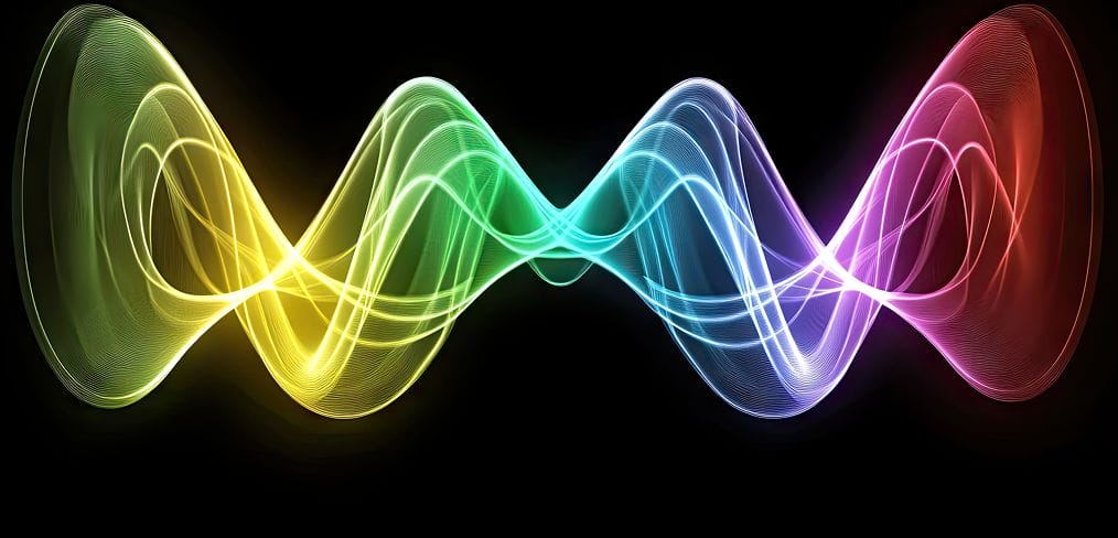 Colorful, abstract light waves in yellow, green, blue, purple, and red, intertwine and curve symmetrically on a black background, creating a vibrant, flowing pattern.